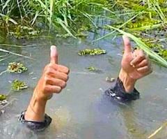 The waterjump at this years Grand National was criticised for being too deep. Heres jockey, Fintan OShortpants, giving the thumbs up that hes ok. No news yet, on the horse hes sitting on.