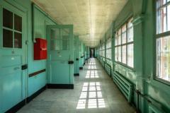 BREAKING NEWS: Chris Beach Arrested In Dawn Raid

Our photograph shows the caption site cells where the inmates were forced to churn out puns for up to sixteen hours a day. Many had not seen their families for several years. One poor inmate had gone 